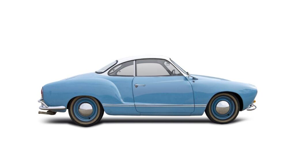 Here's a depiction of a blue and white VW Karmann Ghia isolated on a white background. The car has a sleek and elegant design.